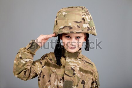 Young soldier with rifle Stock photo © bloodua