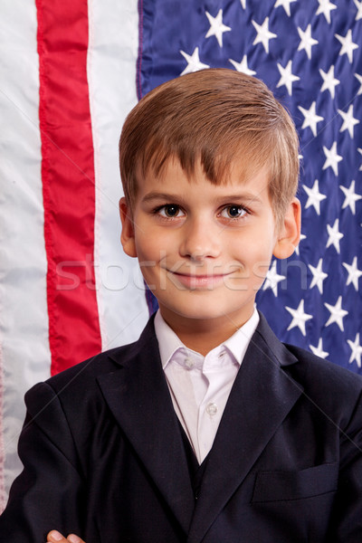 Portait of Caucasian boy with American flag Stock photo © bloodua