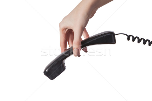 Hand holding an old black telephone tube Stock photo © bloodua
