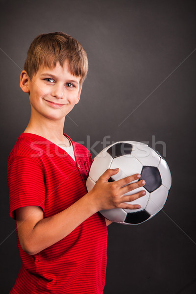 Aranyos fiú tart futball labda futballabda Stock fotó © bloodua