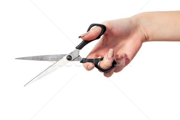 Hand is holding scissors isolated Stock photo © bloodua
