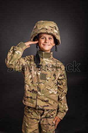 Young soldier with rifle Stock photo © bloodua