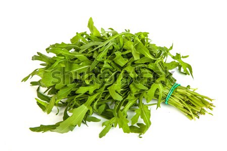 Arugula/rucola  fresh heap leaf on white Stock photo © bloodua