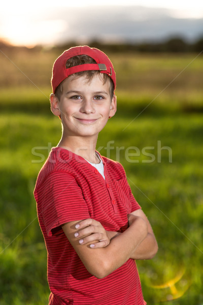 Băiat copil portret zâmbitor drăguţ zece Imagine de stoc © bloodua