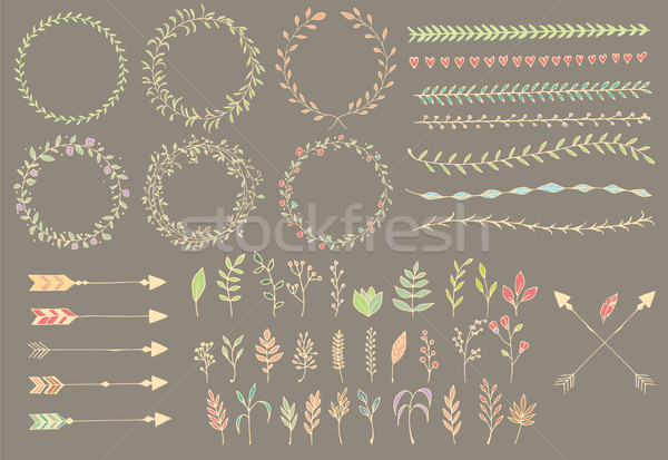 Stock photo: Hand drawn vintage arrows, feathers, dividers and floral elements