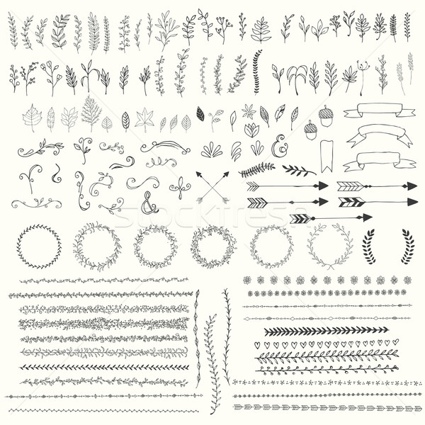 Stock photo: Hand drawn vintage leaves, arrows, feathers, wreaths, dividers, ornaments and floral decorative elem