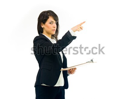 Businesswoman pointing finger upward smiling Stock photo © bmonteny