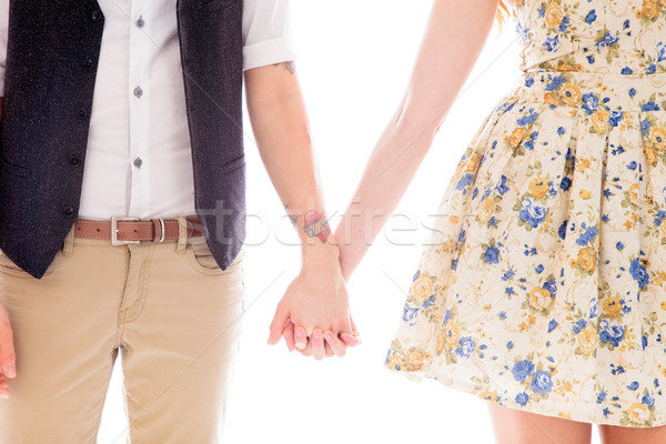 Lesbian couple standing together and holding hands Stock photo © bmonteny