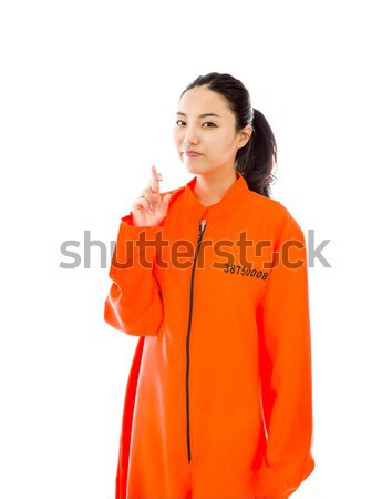 Young Asian woman smiling in prisoners uniform Stock photo © bmonteny