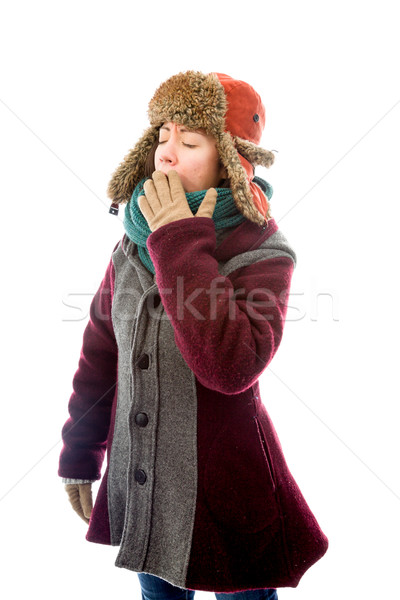 Young woman in warm clothing and yawning Stock photo © bmonteny