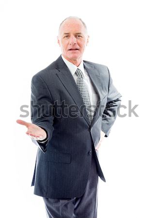 Businessman standing with finger crossed for luck Stock photo © bmonteny