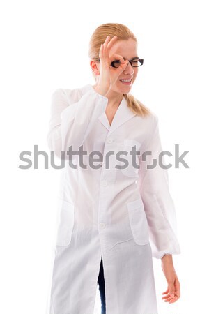 Young woman standing in bathrobe and  biting fingernails Stock photo © bmonteny