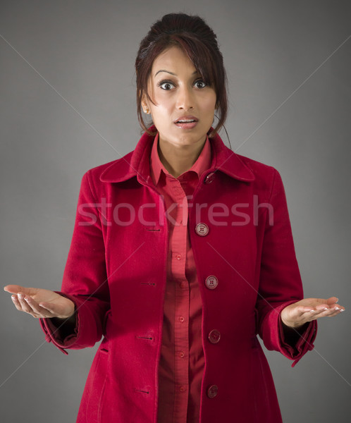 Stock photo: Indian young woman with shocked expression isolated on a colored background