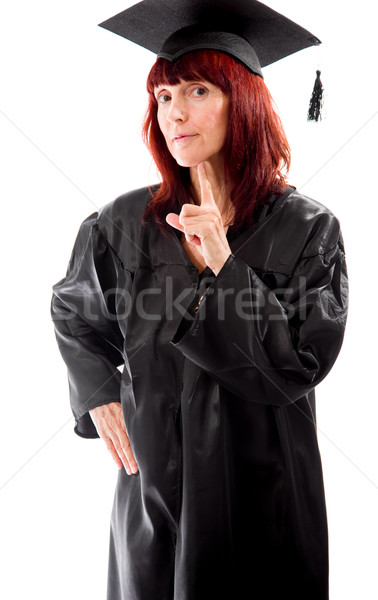 Mature student standing with her hand on chin Stock photo © bmonteny