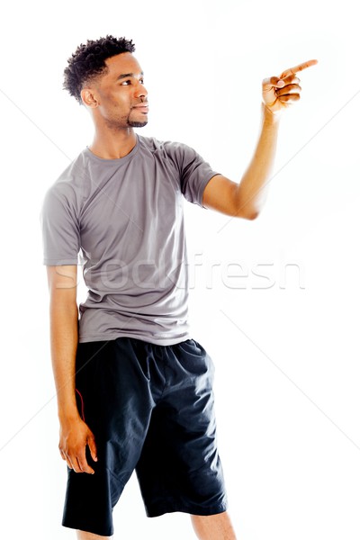 Attractive afro-american man posing in studio Stock photo © bmonteny