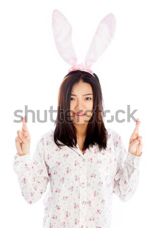 Portrait of sexy asian cowgirl wearing easter's bunny ears Stock photo © bmonteny