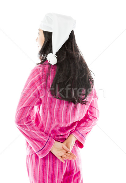 Rear view of an Asian young woman day dreaming Stock photo © bmonteny
