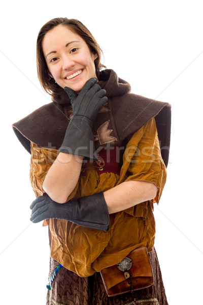 Stock photo: Young woman smiling with her hand on chin