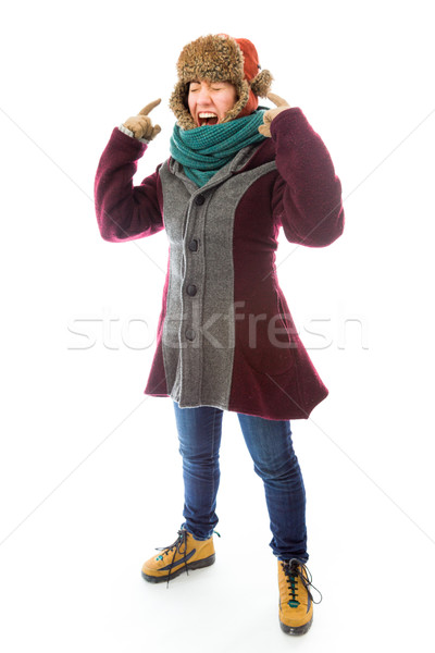 Frustrated young woman in warm clothing Stock photo © bmonteny