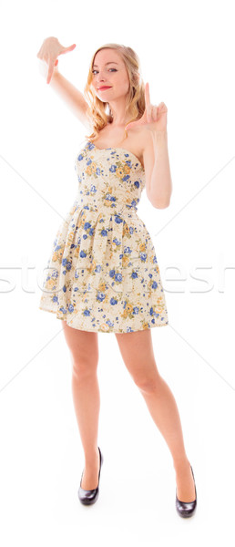 Young woman making frame with fingers Stock photo © bmonteny