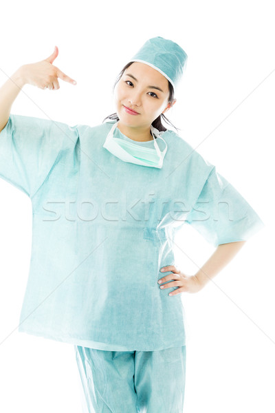 亞洲的 女 外科醫生 指向 孤立 白 商業照片 © bmonteny