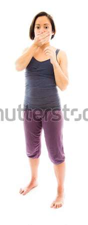 Young woman with hand over her mouth and shock Stock photo © bmonteny