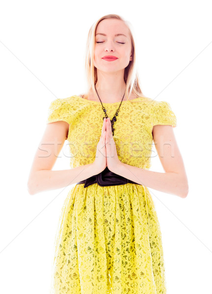 Fiatal nő áll ima pozició ruha fotózás Stock fotó © bmonteny