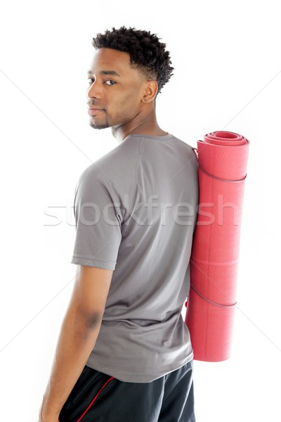 Attractive afro-american man posing in studio Stock photo © bmonteny