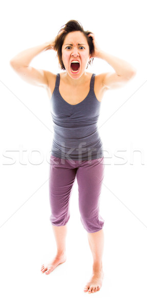 Frustrated woman pulling her hair Stock photo © bmonteny
