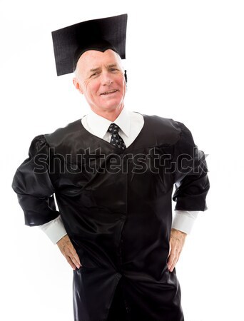 Senior male graduate standing with finger crossed Stock photo © bmonteny
