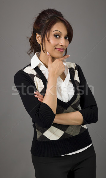 Indian businesswoman with her hand on chin Stock photo © bmonteny