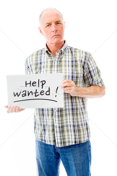 Senior man holding a message board with the text words 'Help wan Stock photo © bmonteny