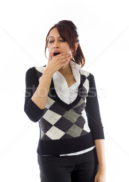 Indian businesswoman yawning with hand over mouth Stock photo © bmonteny