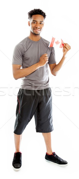 Attractive afro-american man posing in studio Stock photo © bmonteny