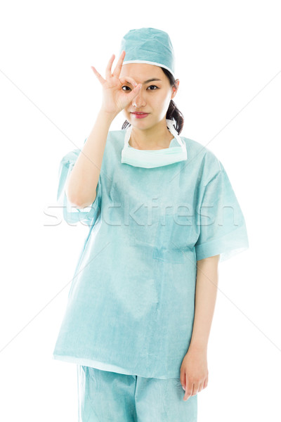Asian weiblichen Chirurg Zeichen Stock foto © bmonteny
