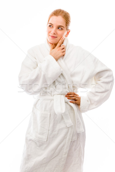Young woman standing in bathrobe with hand on hip Stock photo © bmonteny