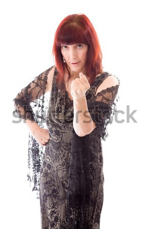 Reife Frau stehen Hand Kinn Frau Kleid Stock foto © bmonteny