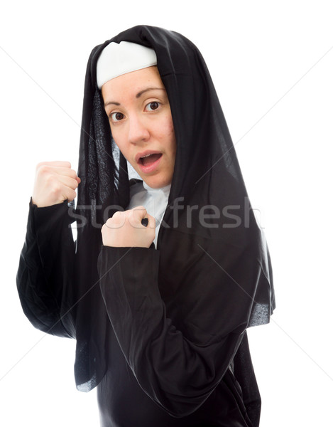 Young nun celebrating success Stock photo © bmonteny