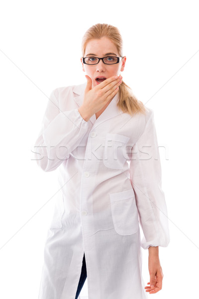 Female scientist standing and looking shocked Stock photo © bmonteny