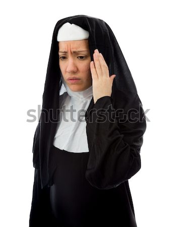 Young nun suffering from headache Stock photo © bmonteny