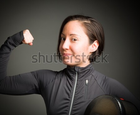 Female fencer showing off her muscle Stock photo © bmonteny