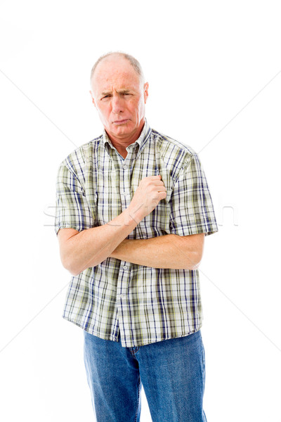Stock photo: Senior man shivering in the cold isolated on white background