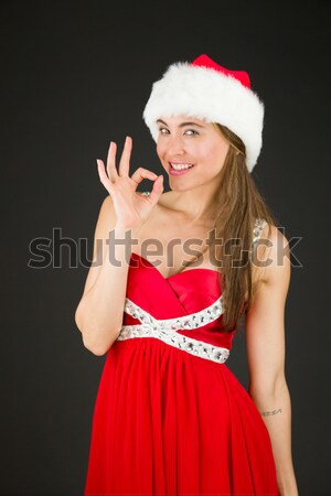 Sexy asian santa claus on grey backgroound relaxed Stock photo © bmonteny