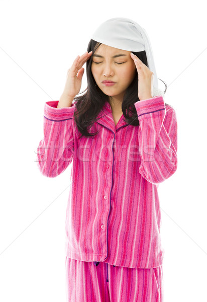 Young Asian woman suffering from headache Stock photo © bmonteny