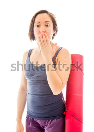 Young woman with a finger on lips Stock photo © bmonteny