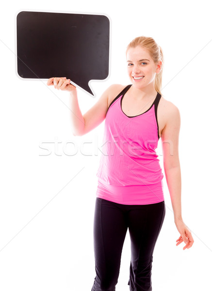 Young woman holding a blank speech bubble Stock photo © bmonteny