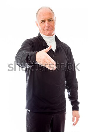 Senior man offering hand for handshake Stock photo © bmonteny