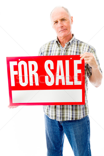 Senior homem venda assinar vermelho Foto stock © bmonteny