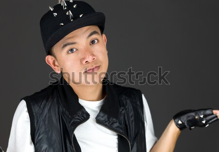 Young Asian woman looking shocked in prisoners uniform Stock photo © bmonteny