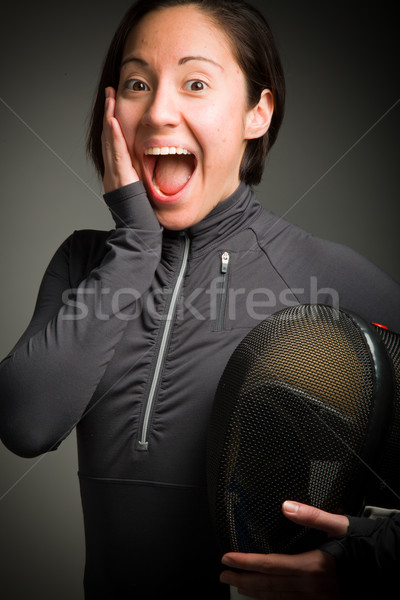 Female fencer looking surprised Stock photo © bmonteny
